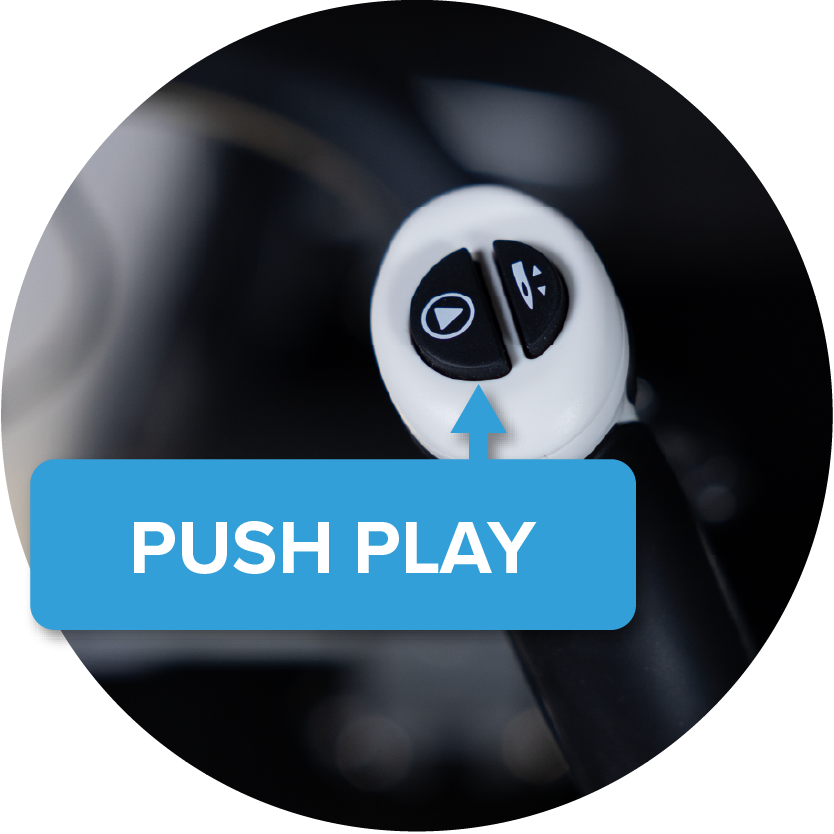 Closeup of the play button with a Push Play callout